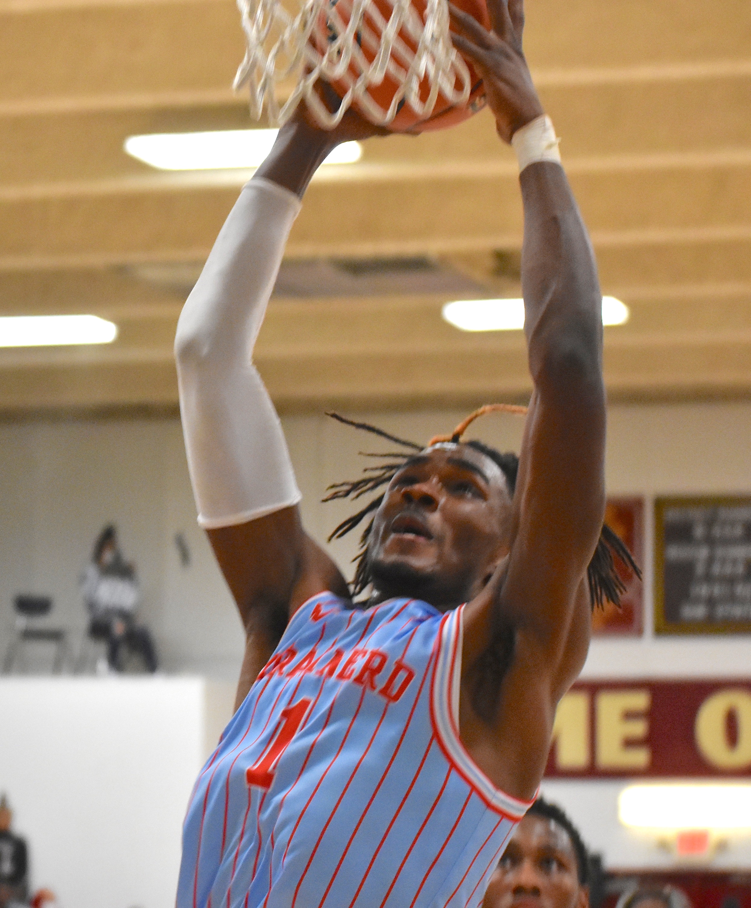 Staff photo by Patrick MacCoon / Brainerd's Donivon Thomas rises for a dunk against Tyner on Friday night.