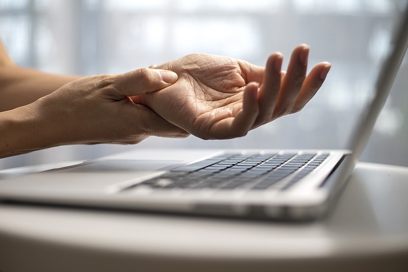 Getty Images / carpal tunnel syndrome hands tile