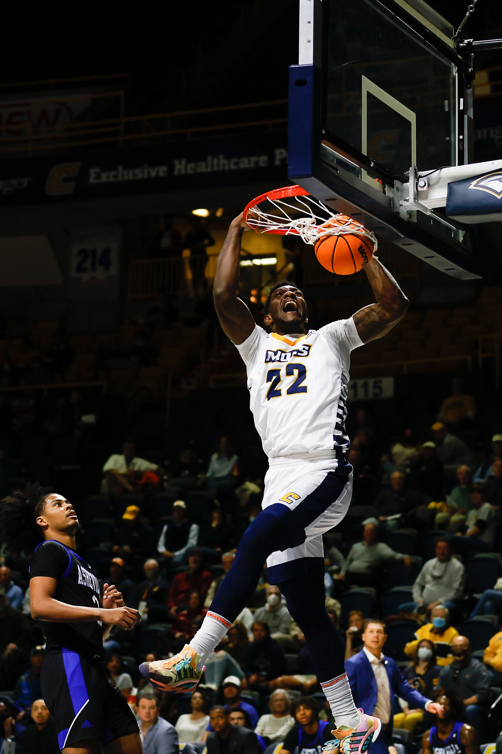 Staff photo by Troy Stolt / Chattanooga Mocs forward Silvio De Sousa (22) dunks the ball on an