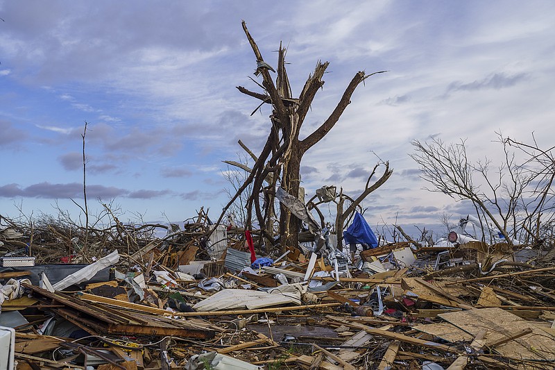 New York Times photo by William DeShazer / Debris from some of the homes completely destroyed in Mayfield, Ky., after a tornado outbreak left at least 88 dead across four states on Saturday.