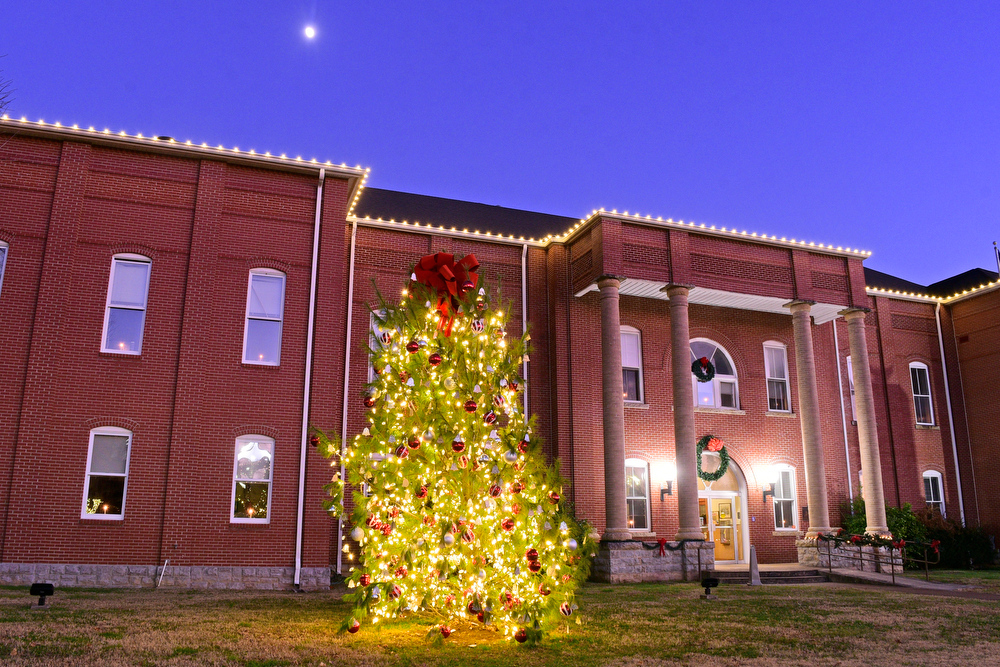 Staff Photo by Robin Rudd / A Christmas tree highlights on Tuesday the Bledsoe County Courthouse in Pikeville, Tenn. Pushed through by the vision of resident and business owner Lola Sells and the help of many others, downtown Pikeville has been transformed this year with the goal of having Christmas decorations (preferably lights) on every home and business on the main street through downtown. Sells says her goal is to make it look like a Hallmark town that people would want to come visit and spend money in.