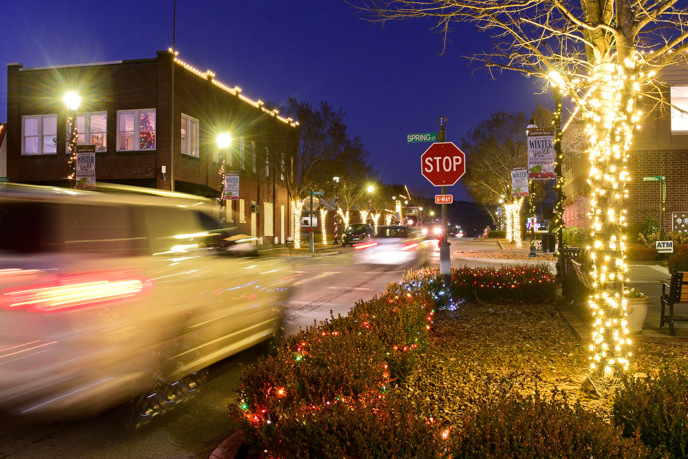 Staff Photo by Robin Rudd / Traffic slows as people view Tuesday the decorations along Main Street. Pushed through by the vision of resident and business owner Lola Sells and the help of many others, downtown Pikeville, Tennessee, has been transformed this year with the goal of having Christmas decorations (preferably lights) on every home and business on the main street through downtown. Sells says her goal is to make it look like a Hallmark town that people would want to come visit and spend money in.