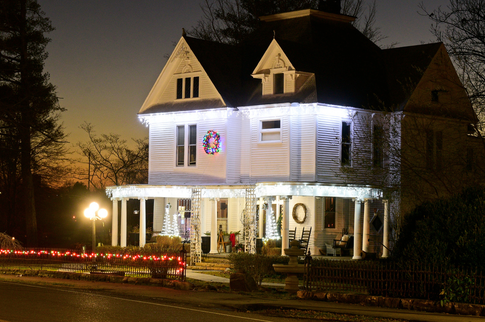 Staff Photo by Robin Rudd / Homes south of downtown on Main Street are decorated Tuesday. Pushed through by the vision of resident and business owner Lola Sells and the help of many others, downtown Pikeville, Tennessee, has been transformed this year with the goal of having Christmas decorations (preferably lights) on every home and business on the main street through downtown. Sells says her goal is to make it look like a Hallmark town that people would want to come visit and spend money in.