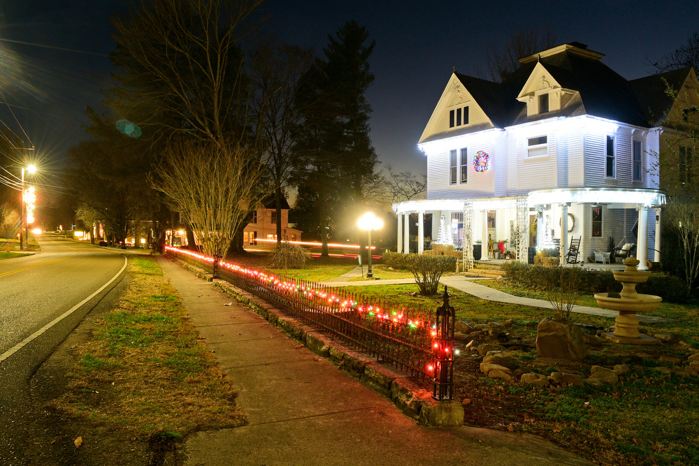 Staff Photo by Robin Rudd / Homes south of downtown on Main Street are decorated Tuesday. Pushed through by the vision of resident and business owner Lola Sells and the help of many others, downtown Pikeville, Tennessee, has been transformed this year with the goal of having Christmas decorations (preferably lights) on every home and business on the main street through downtown. Sells says her goal is to make it look like a Hallmark town that people would want to come visit and spend money in.