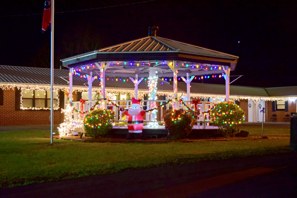 Staff Photo by Robin Rudd / The gazebo at Hannah's Inn is brightly decorated Tuesday. Pushed through by the vision of resident and business owner Lola Sells and the help of many others, downtown Pikeville, Tennessee, has been transformed this year with the goal of having Christmas decorations (preferably lights) on every home and business on the main street through downtown. Sells says her goal is to make it look like a Hallmark town that people would want to come visit and spend money in.