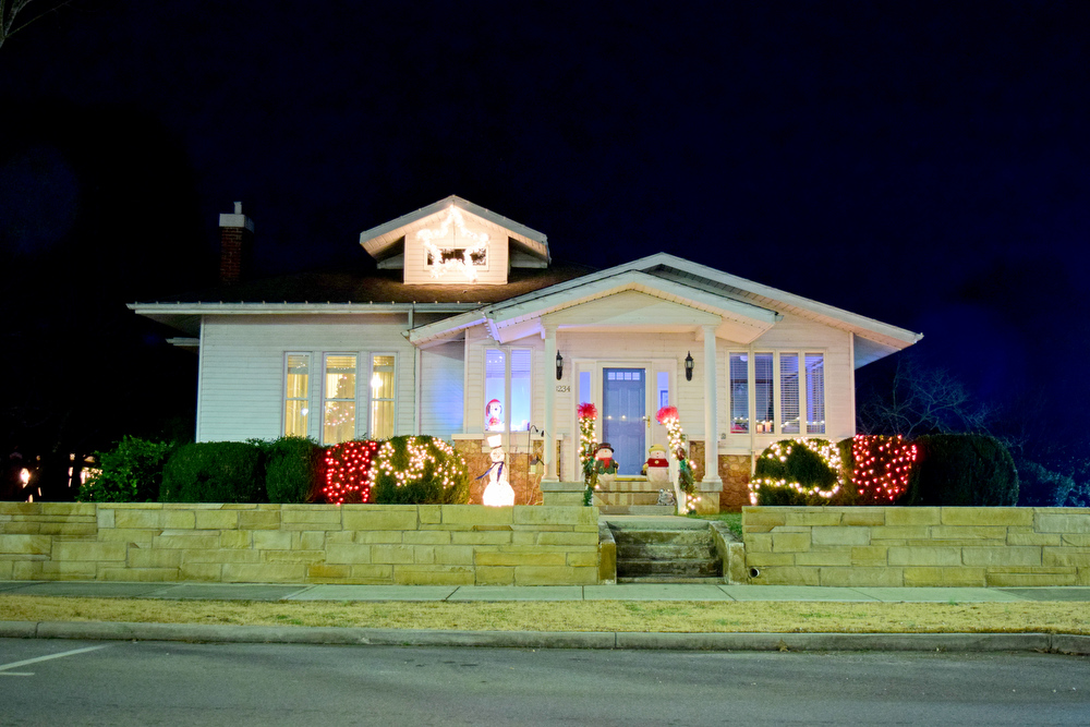 Staff Photo by Robin Rudd / A home north of downtown on Main Street is decorated Tuesday. Pushed through by the vision of resident and business owner Lola Sells and the help of many others, downtown Pikeville, Tennessee, has been transformed this year with the goal of having Christmas decorations (preferably lights) on every home and business on the main street through downtown. Sells says her goal is to make it look like a Hallmark town that people would want to come visit and spend money in.