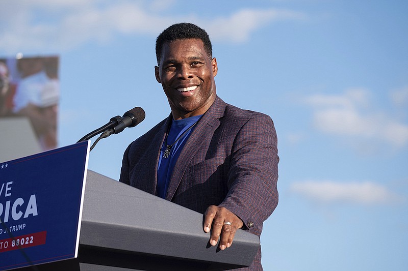 FILE - In this Sept. 25, 2021, file photo Senate candidate Herschel Walker speaks during former President Donald Trump's Save America rally in Perry, Ga. (AP Photo/Ben Gray, File)