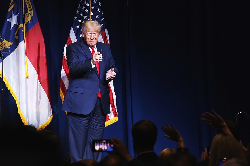 File photo by Travis Dove of The New York Times / Former President Donald Trump arrives on stage to speak at the North Carolina Republican convention in Greenville, N.C., on June 5, 2021.