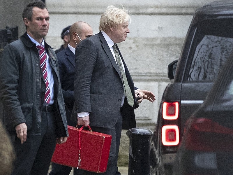 Britain's Prime Minister Boris Johnson leaves Downing Street in London, Friday Dec. 17, 2021. (Joshua Bratt/PA via AP)


