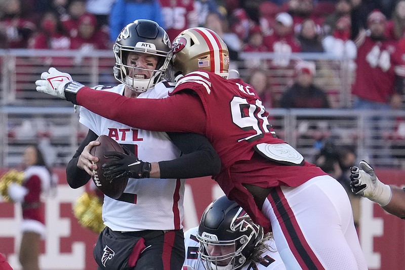 AP photo by Tony Avelar / Atlanta Falcons quarterback Matt Ryan is hit by San Francisco 49ers defensive end Arden Key, who was called for a penalty on the play, during the first half of Sunday's game in Santa Clara, Calif.