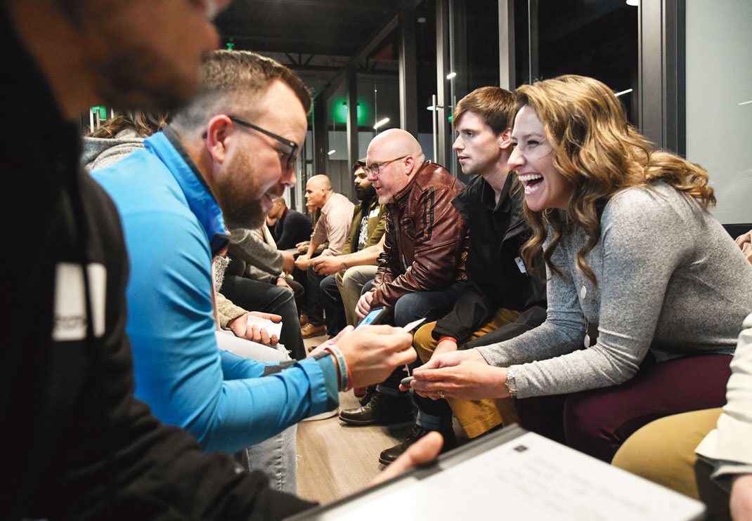 Photography by Mark Gilliland / Attendees participate in a speed networking session at DStation Creative Space