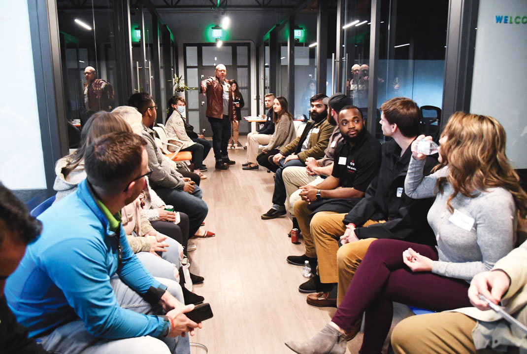 Photography by Mark Gilliland / Attendees participate in a speed networking session at DStation Creative Space