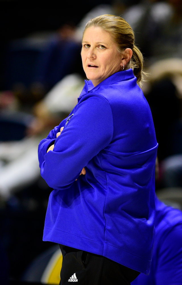 Staff Photo by Robin Rudd / Asheville head coach Honey Brown directs the Bulldogs. The University of Tennessee at Chattanooga Mocs hosted the University of Asheville in NCAA women's basketball at McKenzie Arena on December 20, 2021.