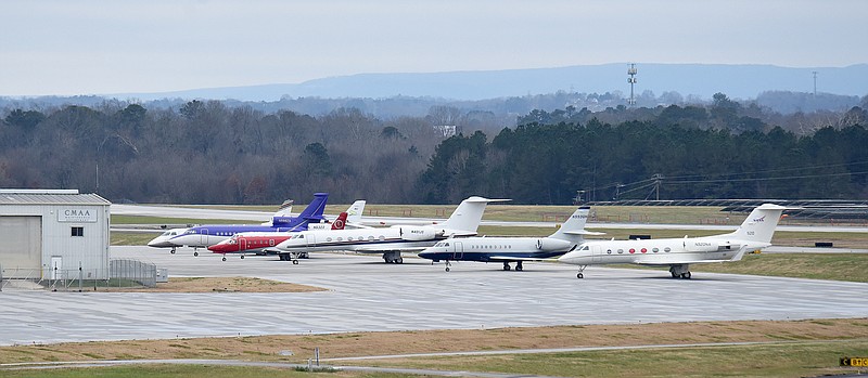 Staff Photo by Matt Hamilton / Planes sit parked on the tarmac at the Chattanooga Metropolitan Airport on Sunday, December 19, 2021.