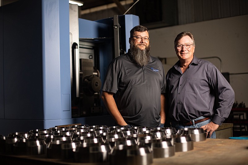 Photography by Troy Stolt / Precision Machining sales leader Steve Johnson, left, and CEO Wayne Oettinger at the company's facility.