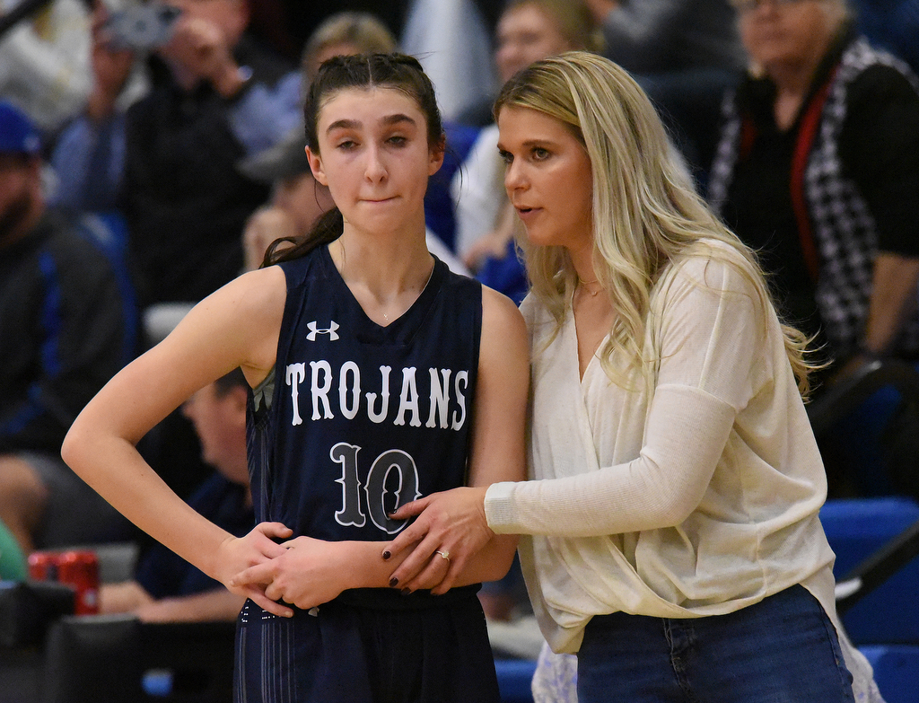Staff Photo by Matt Hamilton / Soddy Daisy (10) Alivia Hall talks to coach Katie Collier as a teammate takes a free throw on Tuesday, December 21, 2021 during the championship game of the Sale Creek Christmas basketball tournament. Soddy Daisy went on to win 56-43.