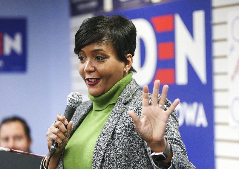 In this Jan. 10, 2020, file photo, Atlanta Mayor Keisha Lance Bottoms speaks in Cedar Rapids, Iowa. Atlanta Mayor Keisha Lance Bottoms has reinstated a mask requirement inside stores and other businesses in the city. Bottoms said Tuesday, Dec. 21, 2021 she was responding to rising COVID-19 infections, the omicron variant and guidance from the U.S. Centers for Disease Control and Prevention. (Rebecca F. Miller/The Gazette via AP, File