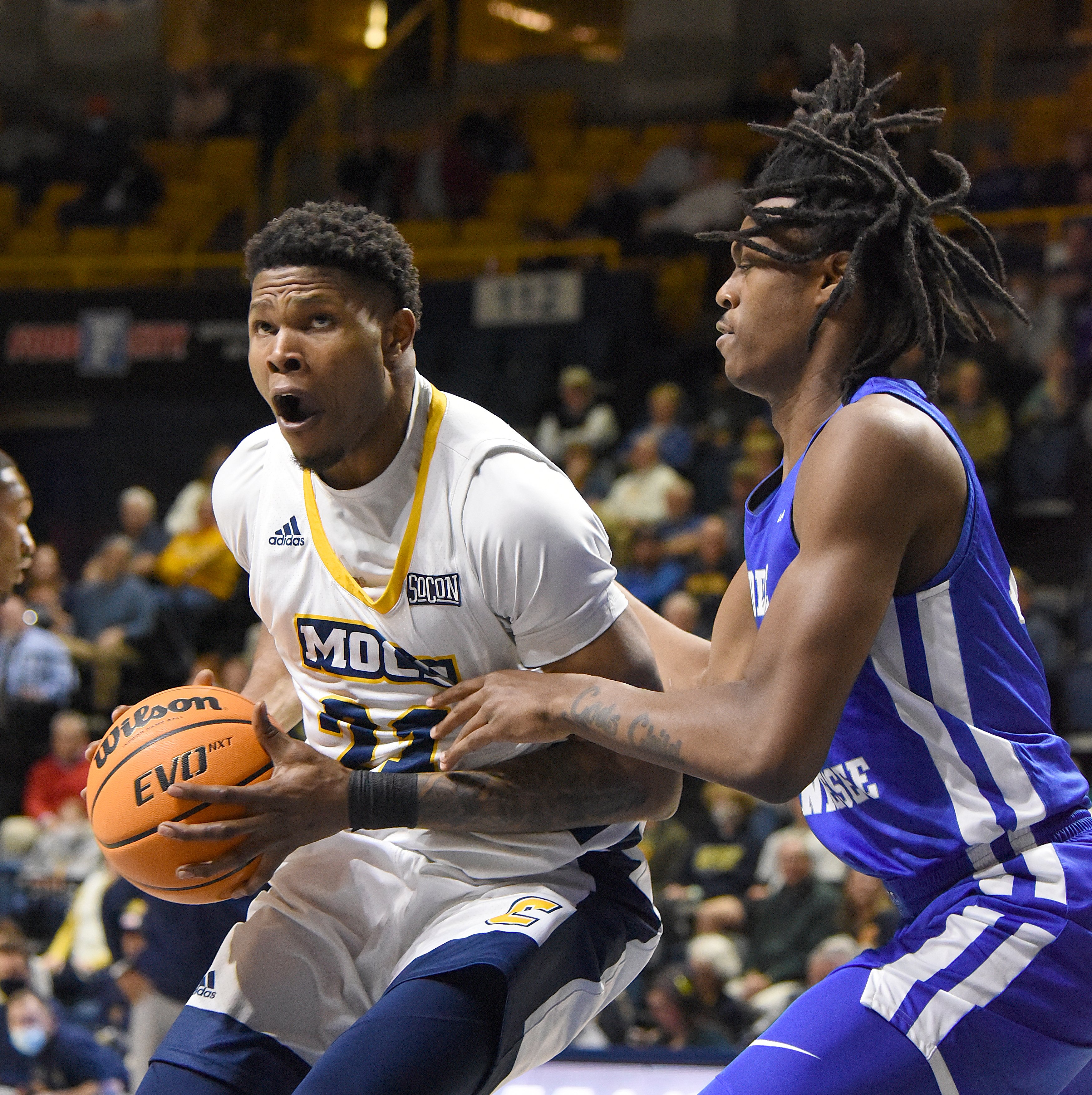 Staff Photo by Matt Hamilton / Middle Tennessee State (15) Christian Fussell defends UTC (21) Josh Ayeni as he drives to the hoop on Wednesday, December 22, 2021 at McKenzie Arena.