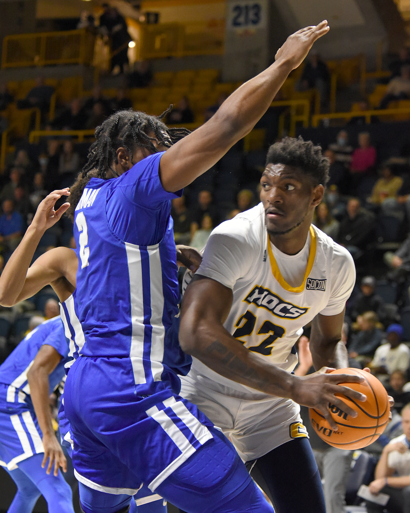 Staff Photo by Matt Hamilton / Middle Tennessee State (2) DeAndre Dishman defends UTC (22) Silvio DeSousa as he looks for an outlet on Wednesday, December 22, 2021 at McKenzie Arena.