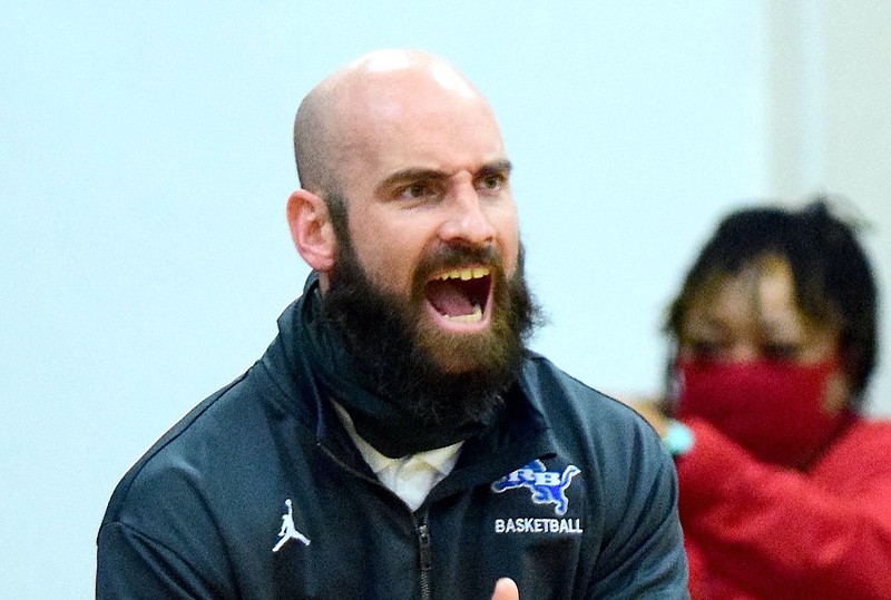 Staff Photo by Robin Rudd / Red Bank head coach Nick Fike urges on the Lions. The Tyner Rams hosted the Red Bank Lions in the boy's TSSAA Region 3-AA Tournament Semifinals on March 2, 2021.
