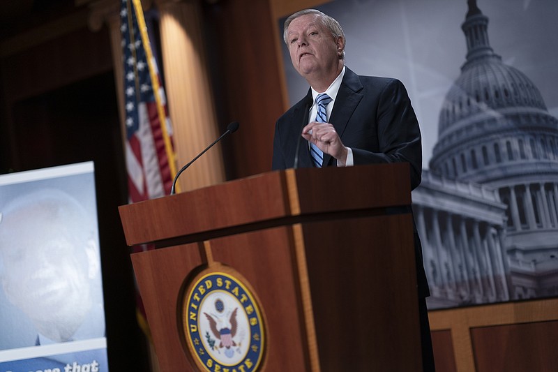 Photo by J. Scott Applewhite of The Associated Press / Sen. Lindsey Graham, R-S.C., speaks at a news conference as the Senate continues to grapple with end-of-year tasks at the Capitol in Washington on Thursday, Dec. 16, 2021.