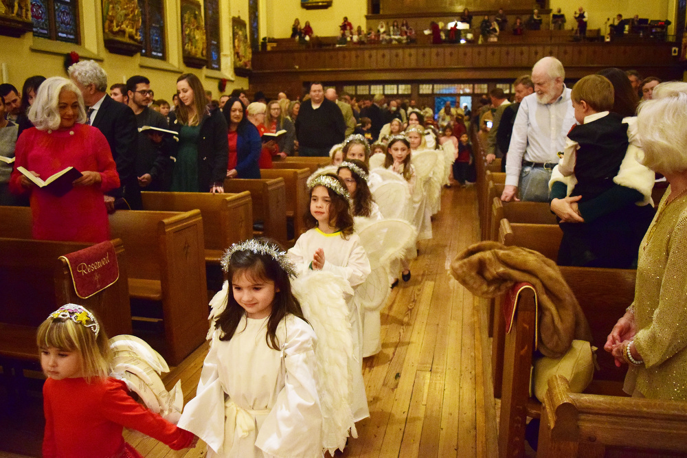 Staff Photo by Robin Rudd / Angels lead the cast of the Christmas Pageant. The Vigil Mass of Christmas was celebrated at the Basilica of Saints Peter and Paul on December 24, 2021.