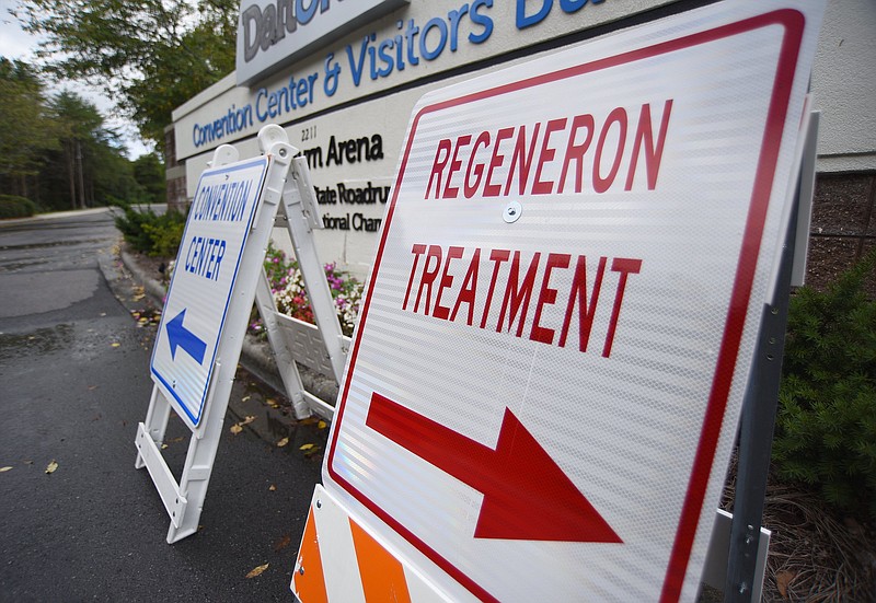 Staff File Photo by Matt Hamilton / A sign points patients toward a Regeneron clinic offering monoclonal antibody treatments in Dalton, Georgia, on September 1, 2021. The U.S. government recently paused the distribution of Regeneron and some other popular antibody treatments, saying the therapies were unlikely to be effective against the omicron variant.