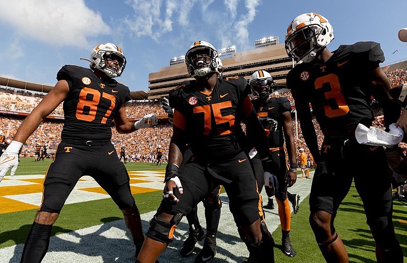 Tennessee Athletics photo / Tennessee senior offensive lineman Jerome Carvin (75) celebrates a touchdown during the 45-20 win over South Carolina with tight end Jacob Warren (87) and receiver JaVonta Payton (3).