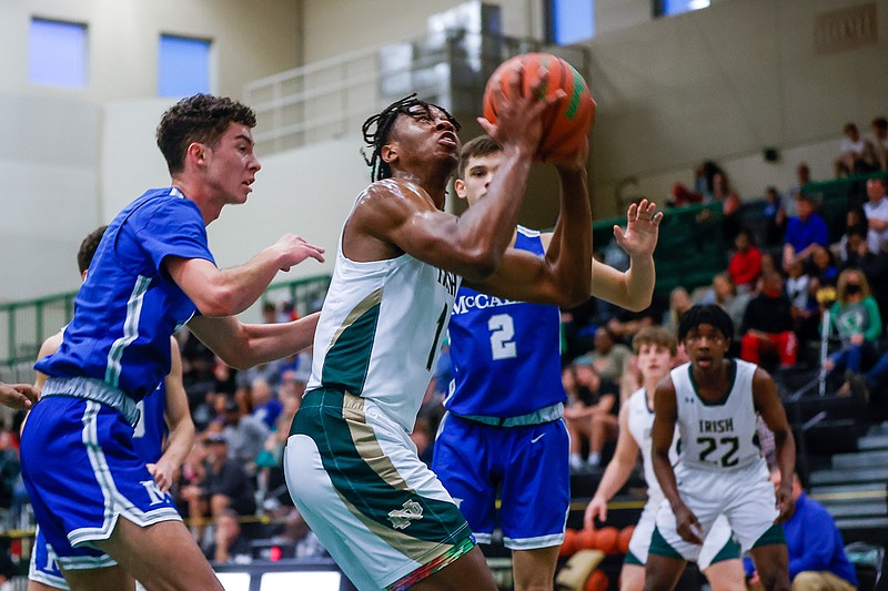 Prep boys' basketball roundup Tyner, McCallie take different paths to