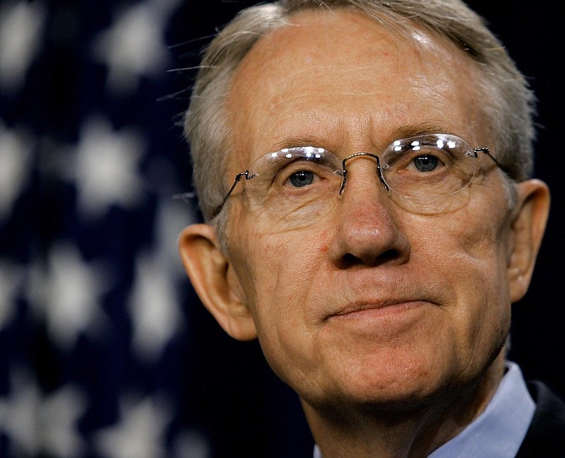 Sen. Harry Reid, D-Nev., speaks to reporters in the Capitol after winning election by his Democratic peers as the new Senate minority leader, on Nov. 16, 2004, in Washington. Reid, the former Senate majority leader and Nevada's longest-serving member of Congress, has died. He was 82. (AP Photo/J. Scott Applewhite, File)