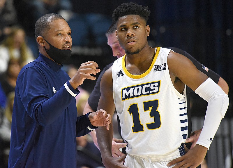 Staff Photo by Matt Hamilton / Head coach Lamont Paris talks with UTC (13) Malachi Smith on Tuesday, November 23, 2021. University of Tennessee at Chattanooga defeated Covenant College at McKenzie Arena, 100-39. 