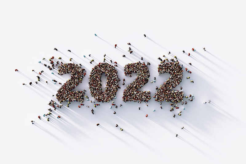 Human crowd forming 2022 on white background. Horizontal  composition with copy space. Directly above. Clipping path is included. 2022 and new year concept.