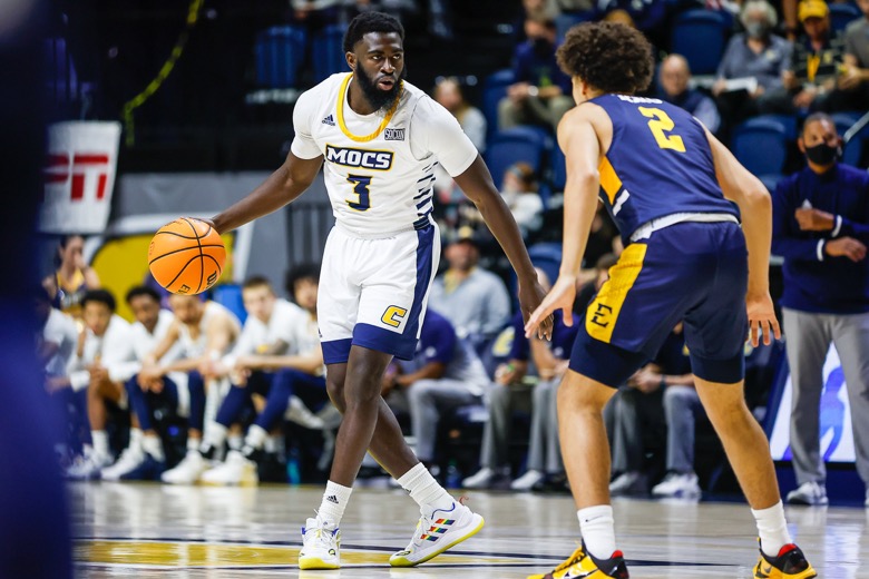 Staff photo by Troy Stolt / UTC Mocs guard David Jean-Baptiste (3) brings the ball down the court during the basketball game between UTC and East Tennessee State at Mckenzie Arena on Thursday, Dec. 30, 2021 in Chattanooga, Tenn.