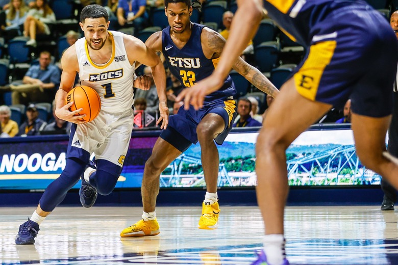 Staff photo by Troy Stolt / UTC Mocs forward KC Hankton (1) drives to the basket during the basketball game between UTC and East Tennessee State at Mckenzie Arena on Thursday, Dec. 30, 2021 in Chattanooga, Tenn.