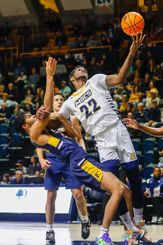 Staff photo by Troy Stolt / UTC Mocs forward Silvio De Sousa (22) grabs a rebound during the basketball game between UTC and East Tennessee State at Mckenzie Arena on Thursday, Dec. 30, 2021 in Chattanooga, Tenn.