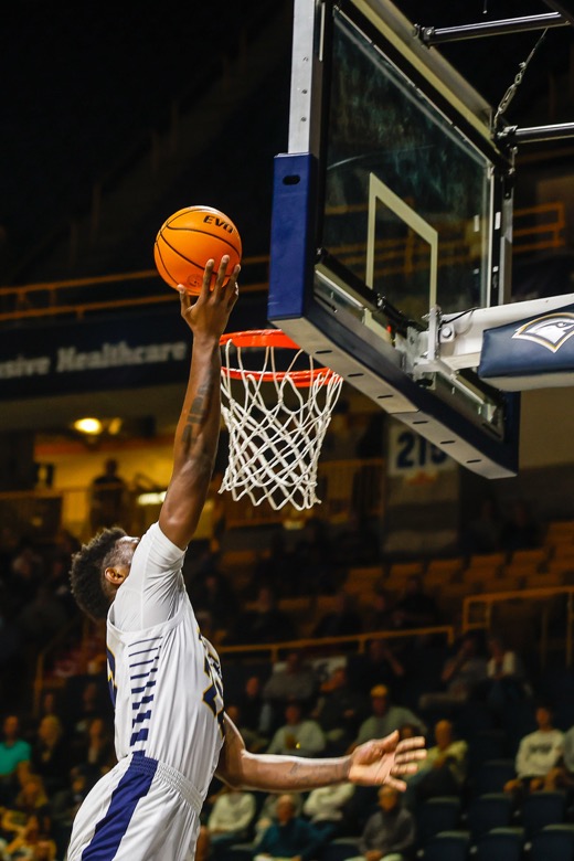 Staff photo by Troy Stolt / UTC Mocs forward Silvio De Sousa (22) goes for a lay up during the basketball game between UTC and East Tennessee State at Mckenzie Arena on Thursday, Dec. 30, 2021 in Chattanooga, Tenn.