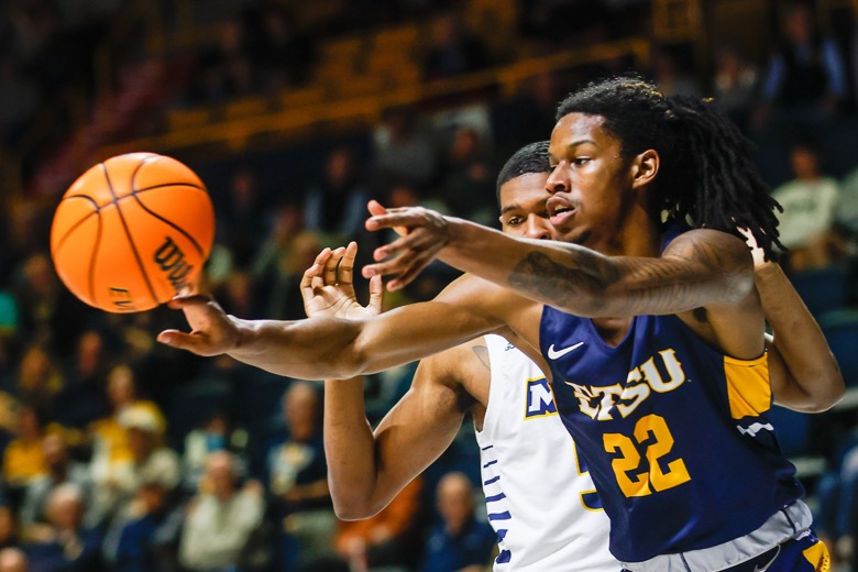Staff photo by Troy Stolt / East Tennessee State Buccaneers forward Jaden Seymour (22) passes the ball during the basketball game between UTC and East Tennessee State at Mckenzie Arena on Thursday, Dec. 30, 2021 in Chattanooga, Tenn.