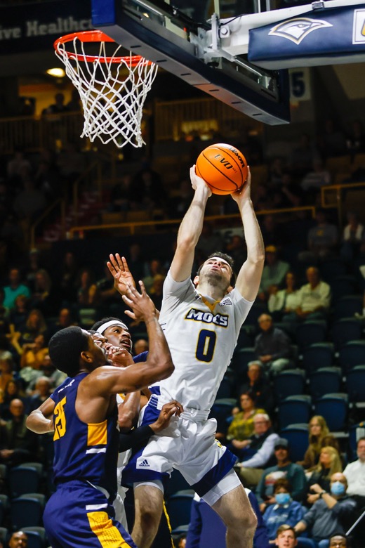 Staff photo by Troy Stolt / UTC Mocs guard A.J. Caldwell (0) shoots the ball during the basketball game between UTC and East Tennessee State at Mckenzie Arena on Thursday, Dec. 30, 2021 in Chattanooga, Tenn.