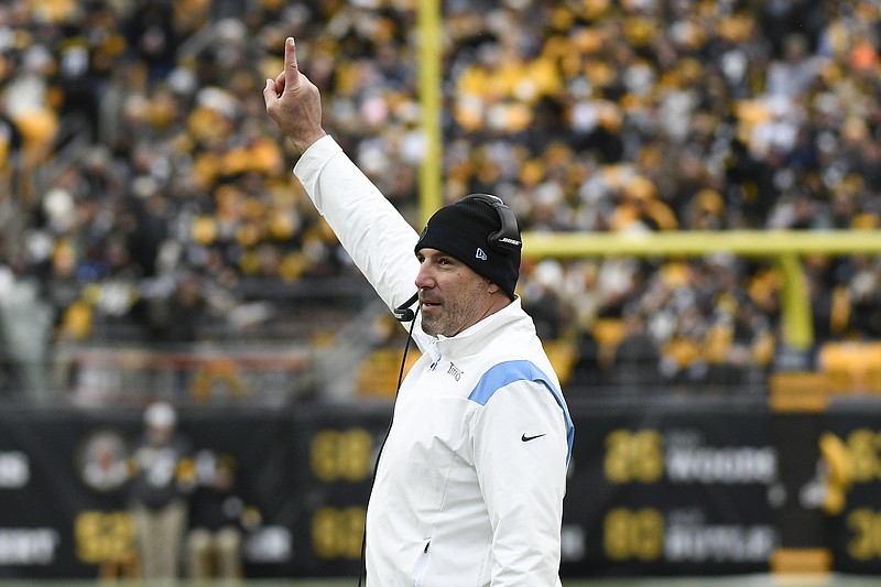 AP photo by Don Wright / Tennessee Titans coach Mike Vrabel signals to his team during a Dec. 19 game against the host Pittsburgh Steelers.