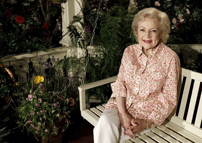 FILE - Actress Betty White poses for a portrait on the set of the television show "Hot in Cleveland" in Studio City section of Los Angeles on Wednesday, June 9, 2010. (AP Photo/Matt Sayles, File)


