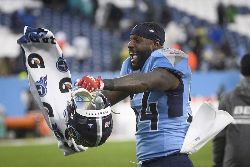 AP photo by John Amis / Tennessee Titans inside linebacker Rashaan Evans celebrates after Sunday's home win against the Miami Dolphins. The Titans repeated as AFC South Division champions to earn their third straight playoff berth, and they also moved into first place in the conference heading into the final week of the regular season.