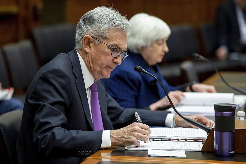 Photo by Amanda Andrade-Rhoades of The Associated Press / Federal Reserve Chairman Jerome Powell, alongside Treasury Secretary Janet Yellen, listen to questions from lawmakers during a House Committee on Financial Services hearing on the Treasury Department's and Federal Reserve's pandemic response at the Capitol in Washington on Dec. 1, 2021. Inflation awoke from a long slumber in 2021. The U.S. government's consumer price index skyrocketed 6.8% in the 12 months that ended in November — the sharpest such jump since 1982.