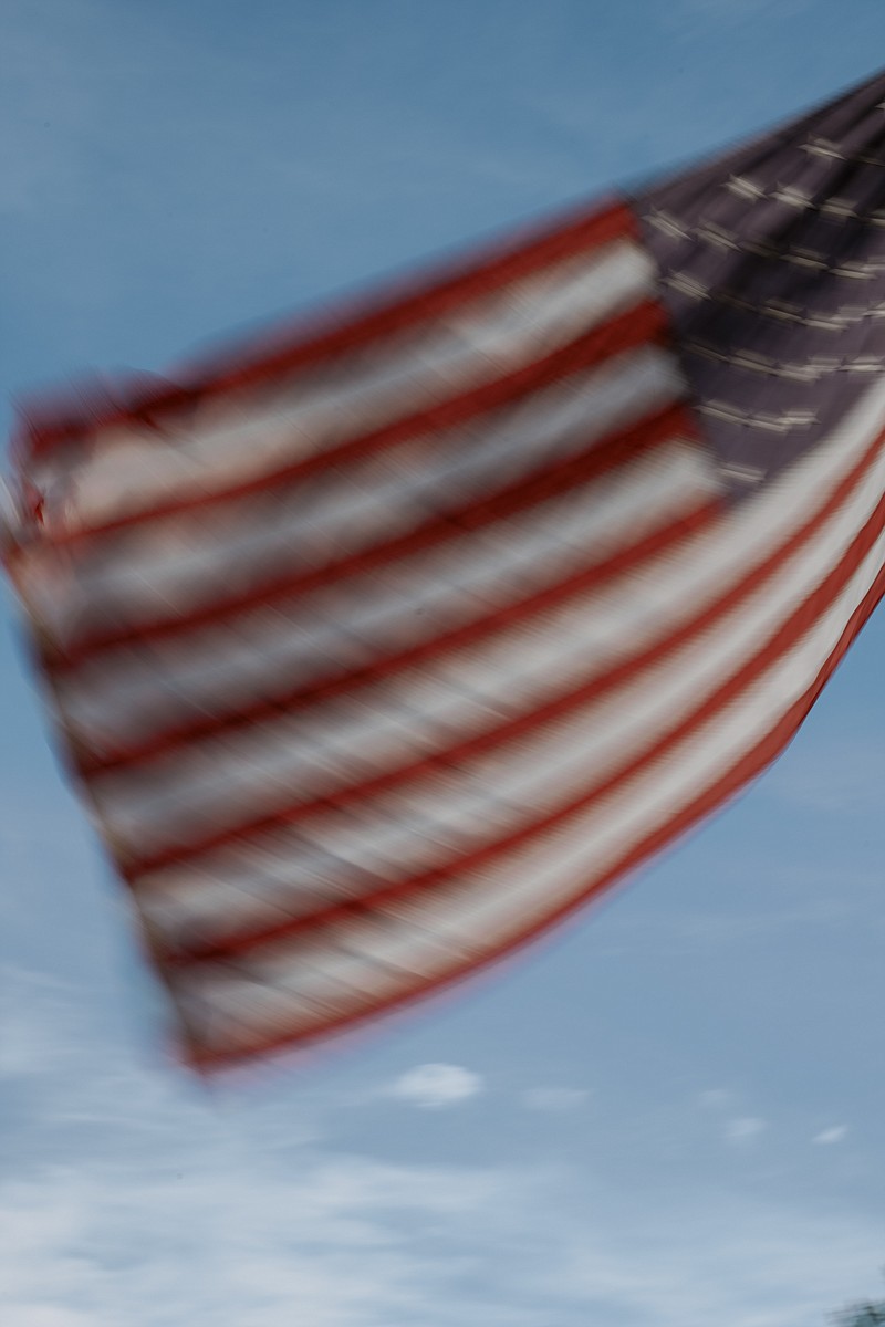 File photo by Kristian Thacker of The New York Times / A torn American flag flies in Shanksville, Pa., on Aug. 30, 2021.