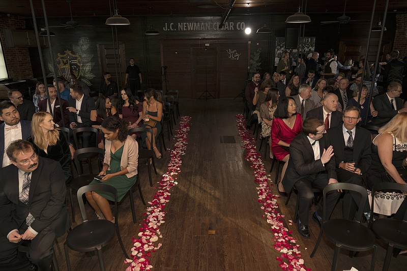 Heather Davis and Nick Gray turned to a nontraditional event space, the J.C. Newman Cigar Co. in Tampa, Fla., for their Dec. 3, 2021, wedding after their first venue, a garden club, double-booked their date. / Photo by Duvan Camilo Zapata Rodríguez/The New York Times