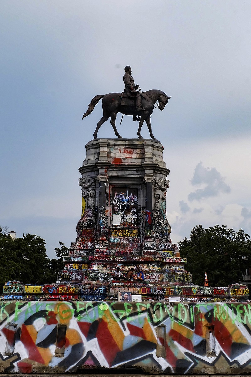 File photo by Nichelle Dailey of The New York Times / The Robert E Lee Monument, which has since been removed, in Richmond, Va., on Aug. 12, 2020.