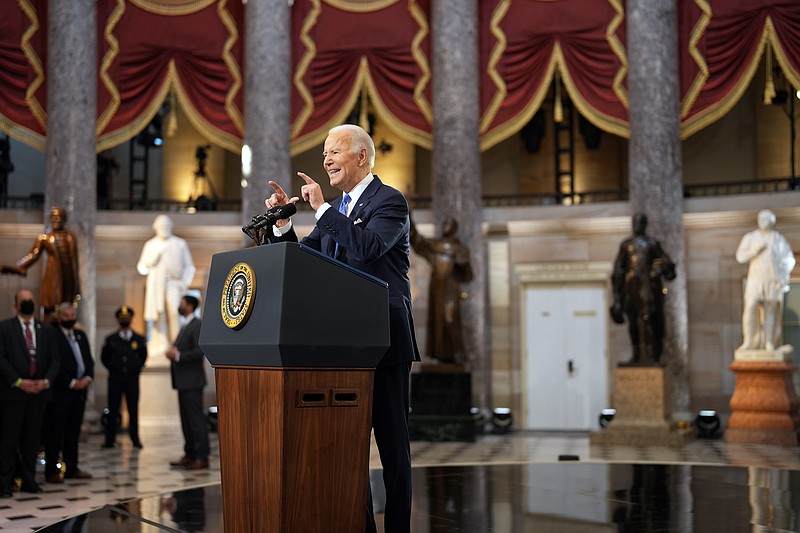 Photo by Doug Mills of The New York Times / President Joe Biden speaks in Statuary Hall at the Capitol in Washington on Thursday, Jan 6, 2022, marking one year since the deadly assault on the Capitol.