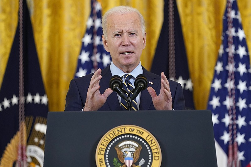 FILE - President Joe Biden speaks from the East Room of the White House in Washington, Dec. 6, 2021. The Biden administration is distributing an additional $4.5 billion in funds to help low-income Americans cover heating costs during a second pandemic winter, with cold-weather states receiving the largest share. (AP Photo/Susan Walsh, FIle)