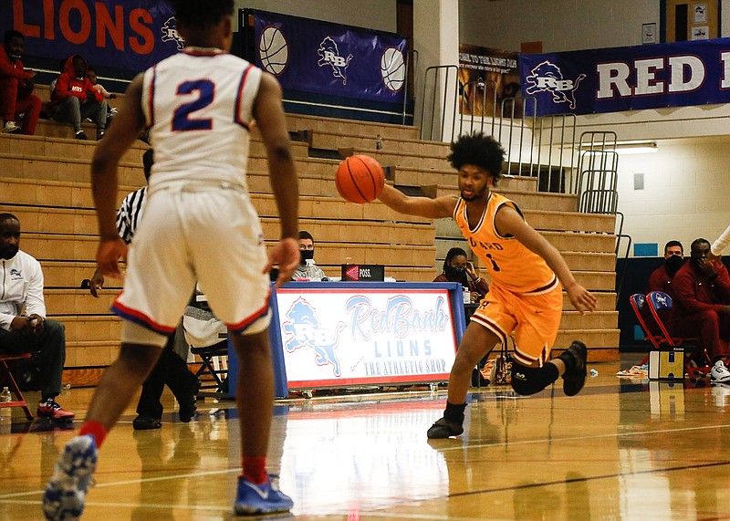 Staff file photo / Howard's Mark Greer, right, had a strong fourth quarter to help the Hustlin' Tigers beat Brainerd on Saturday night and earn their 10th win of the season.