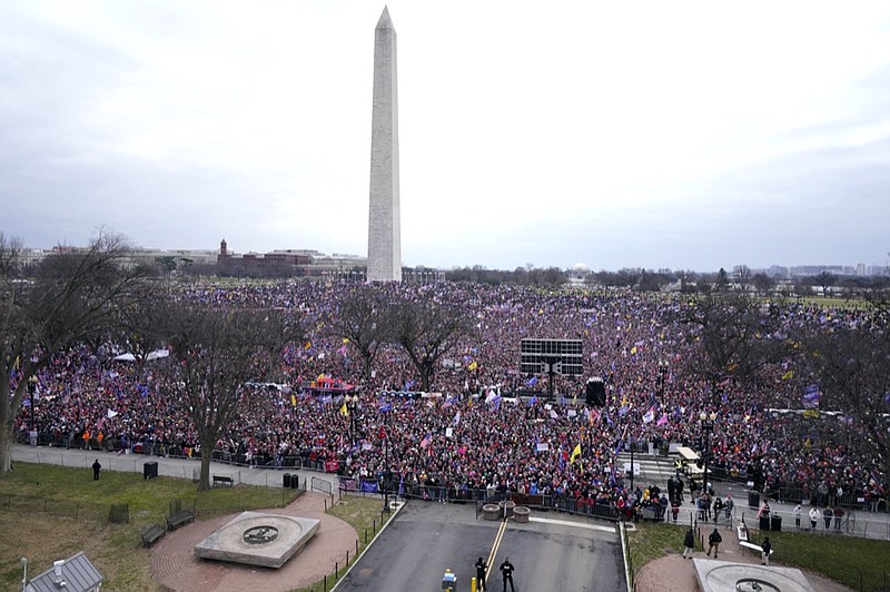 FILE - With the Washington Monument in the background, people attend a rally in support of President Donald Trump on Jan. 6, 2021, in Washington. (AP Photo/Jacquelyn Martin, File)


