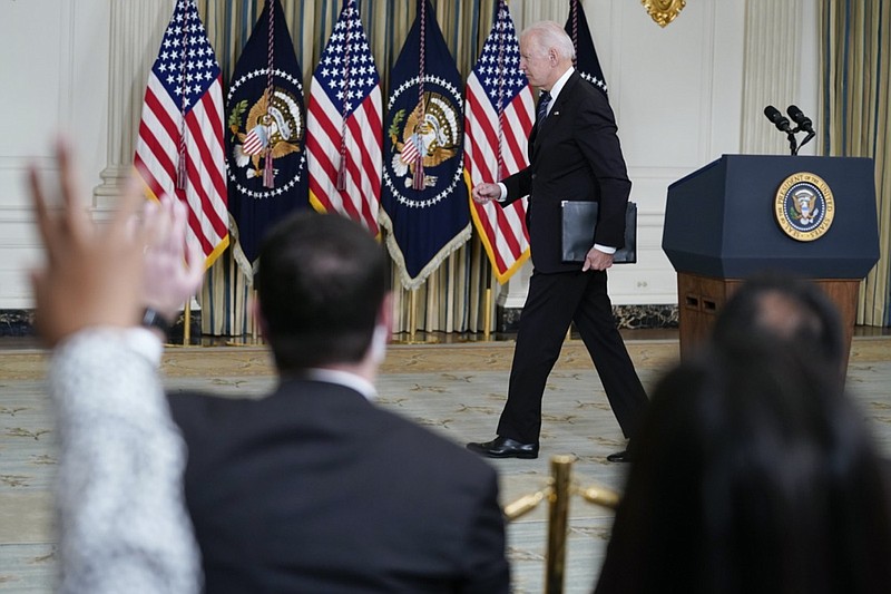 FILE - President Joe Biden departs after speaking about the October jobs report from the State Dining Room of the White House, Nov. 5, 2021, in Washington. As President Joe Biden wraps up his first year in the White House, he has held fewer news conferences than any of  his five immediate predecessors at the same point in their presidencies, and has taken part in fewer media interviews than any of his recent predecessors. That's according to new research from Towson University professor emerita Martha Joynt Kumar. (AP Photo/Evan Vucci, File)